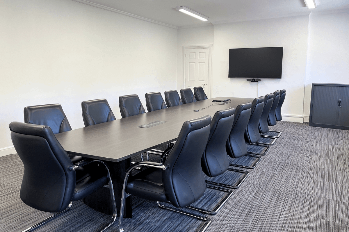 Photo of a medium sized meeting room in a boardroom style