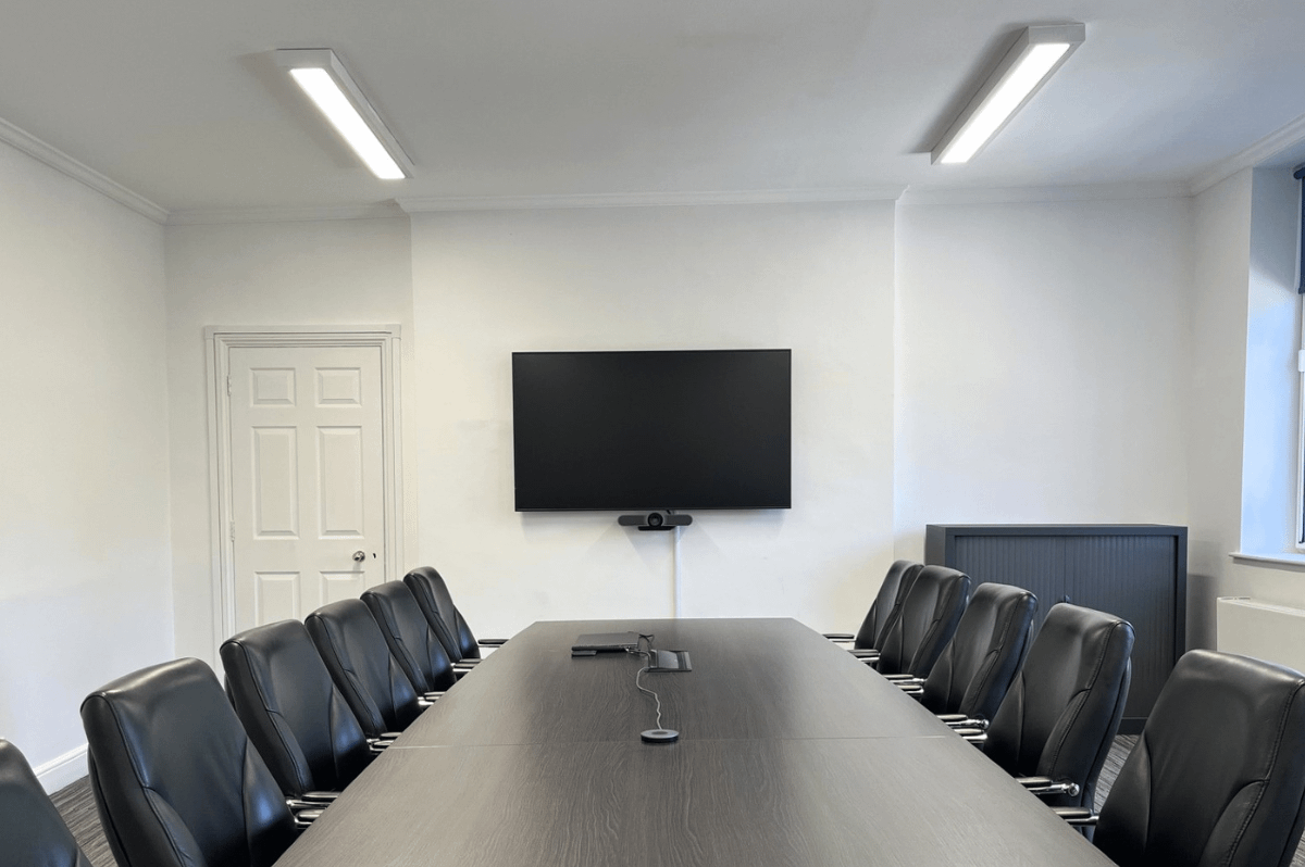Photo of a medium sized meeting room in a boardroom style