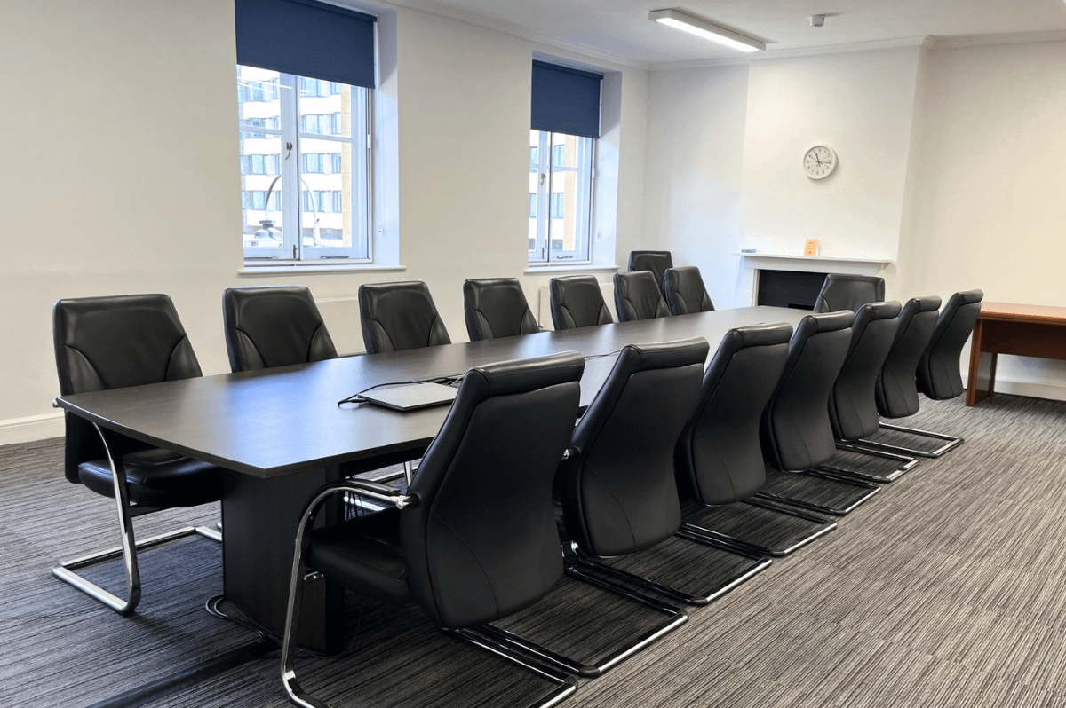 Photo of a medium sized meeting room in a boardroom style