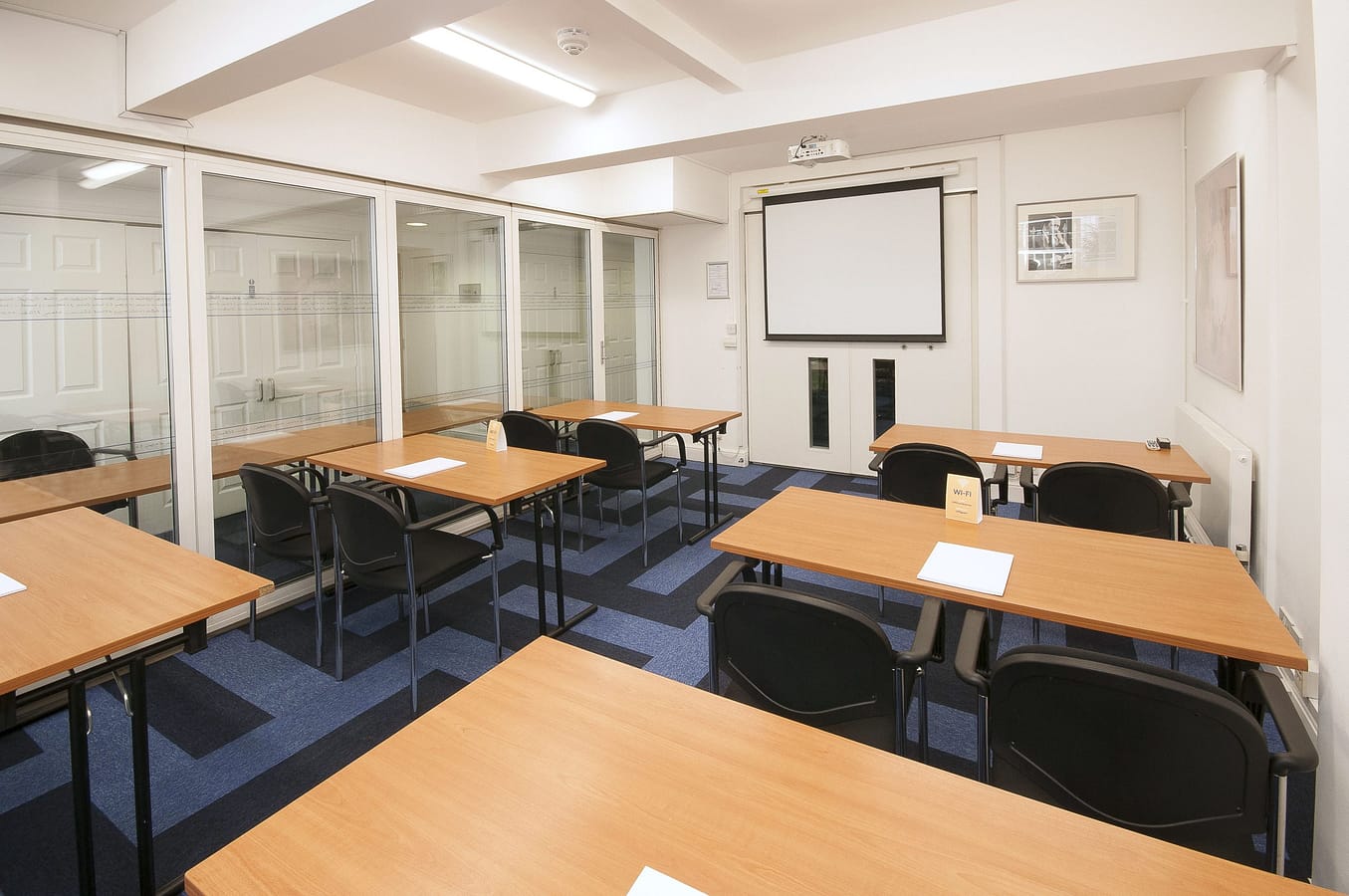 Photo of a medium sized meeting room in a classroom style